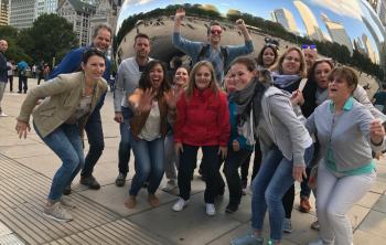 Group photo in front of the Chicago bean.